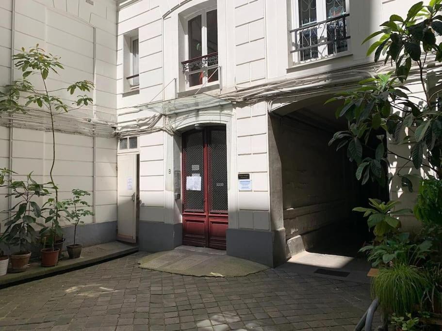 Appartement Haussmanannien Cosy - Republique París Exterior foto